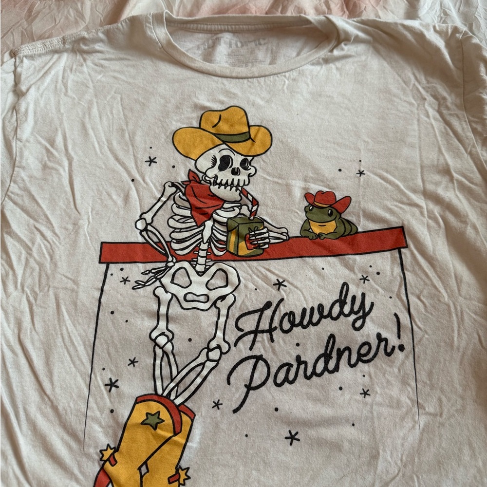 Hot Topic Cream Graphic Tee with Skeleton Design